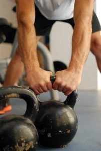 Hold the kettlebell before the flow